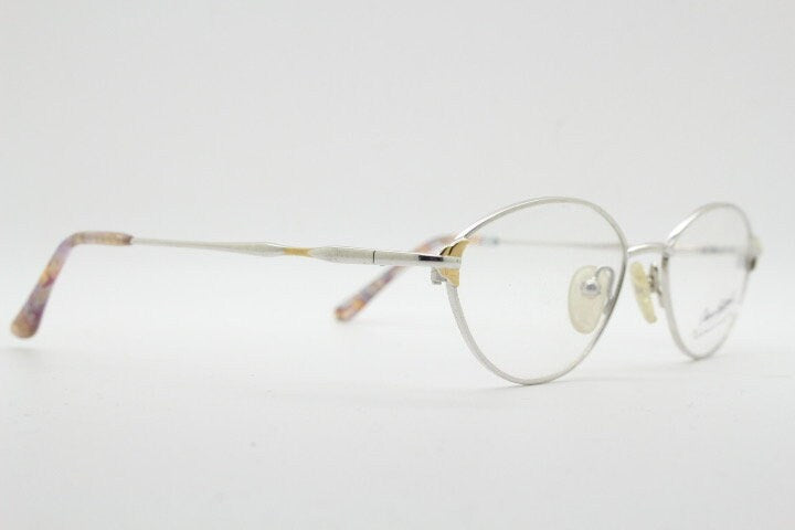 Oliver Goldsmith 90s vintage oval eye glasses model 0839. Silver and gold wire optical frames. Prescription eyeglasses. RX NOS spectacles