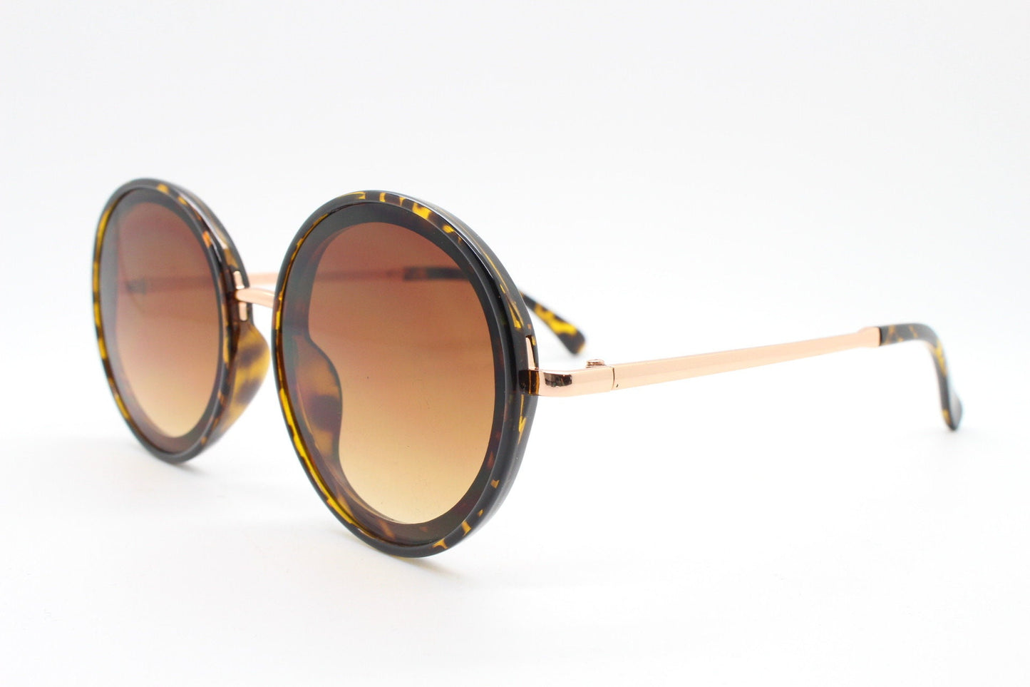Y2k vintage round sunglasses. Women's tortoise frame with contrasting gold arms and brown flat sultry graduating lenses. Unused BNWT