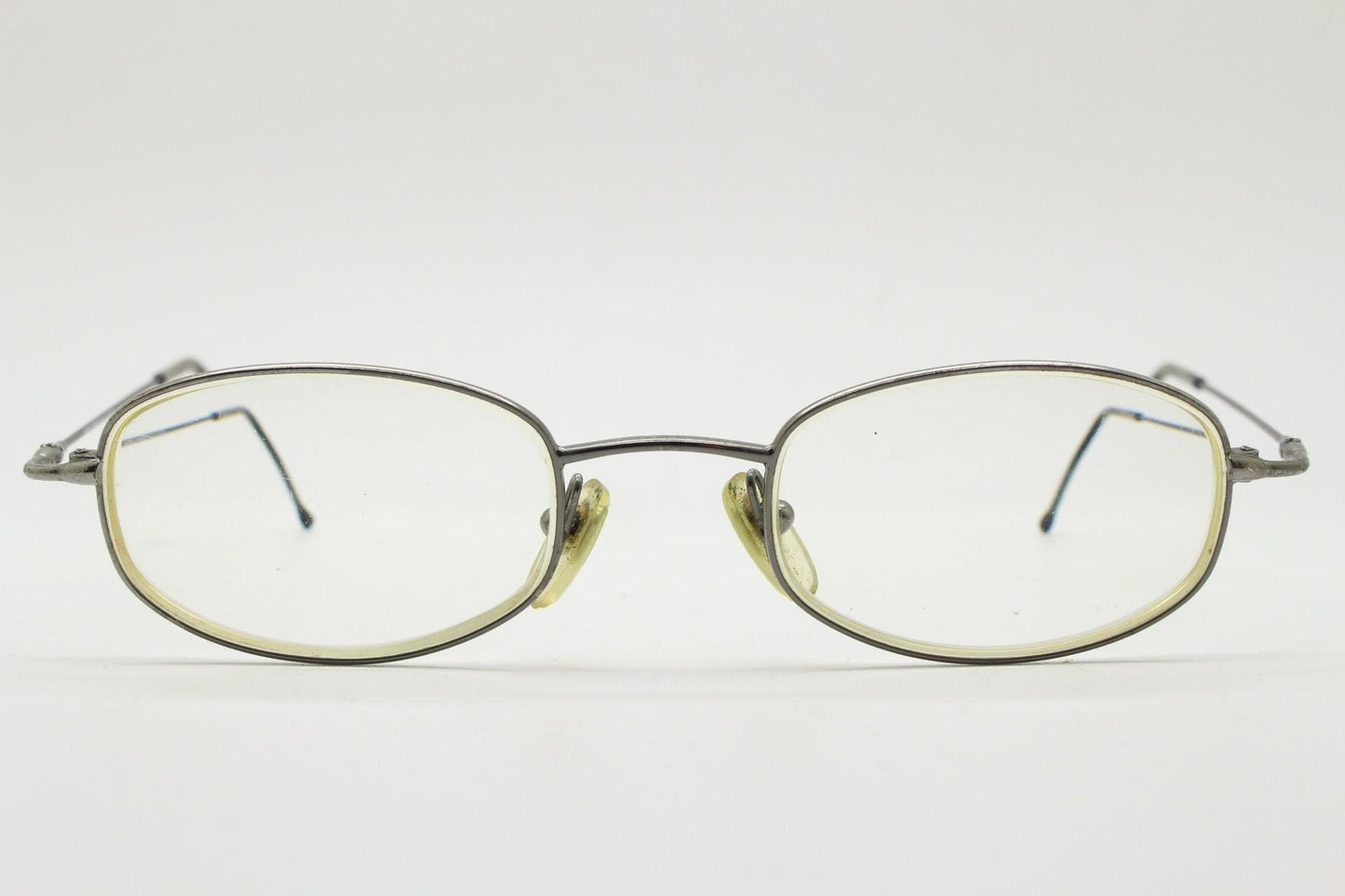 Giorgio Armani 90s vintage angular oval eye glasses made in Italy. Minimal grey chrome metal optical frame. Prescription RX spectacles
