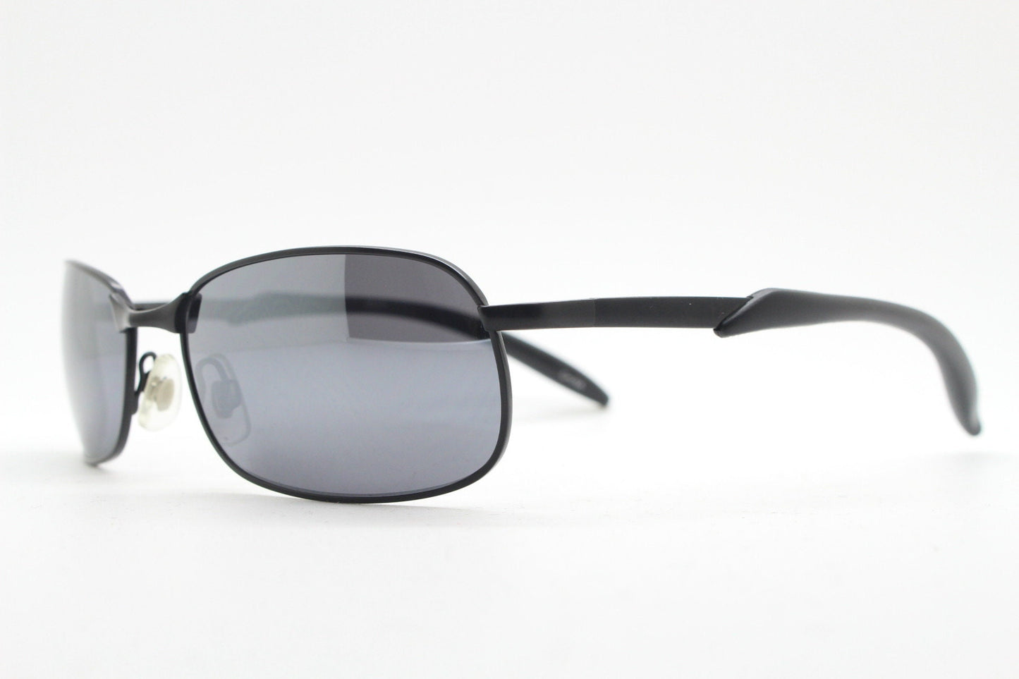 Y2K vintage wraparound sunglasses. Black satin matt finish on rectangular frame with slight mirror glaze lenses. 2000's. 90s. Unused NOS