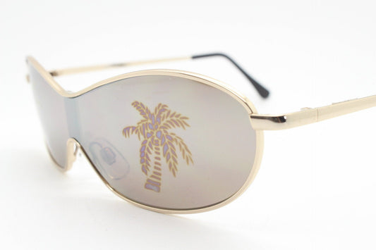 Party monster Y2K vintage visor sunglasses. Wraparound mono lens mini mask shield design with mind bending palm tree print. Unused NOS