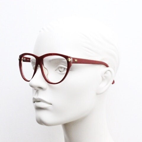 Silhouette 80s vintage oversized cat eye glasses made in Austria. Dramatic red prescription optical frame with subtle criss cross stripes RX