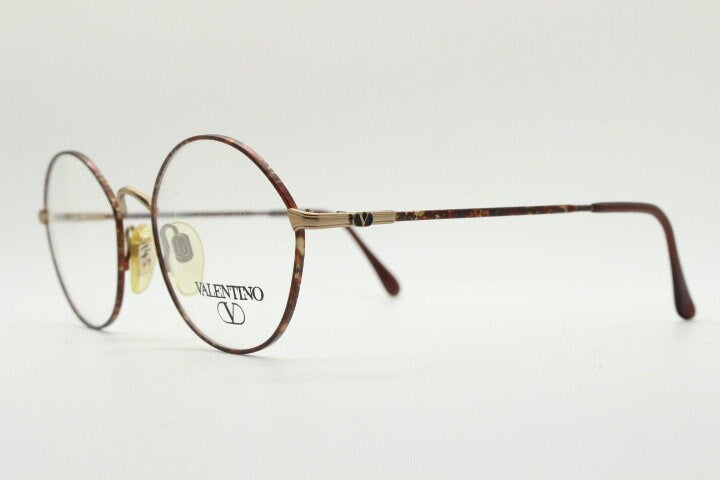 Valentino 90s vintage round panto eye glasses made in Italy. Brushed bronze optical frames with metallic matt tortoise. Prescription RX