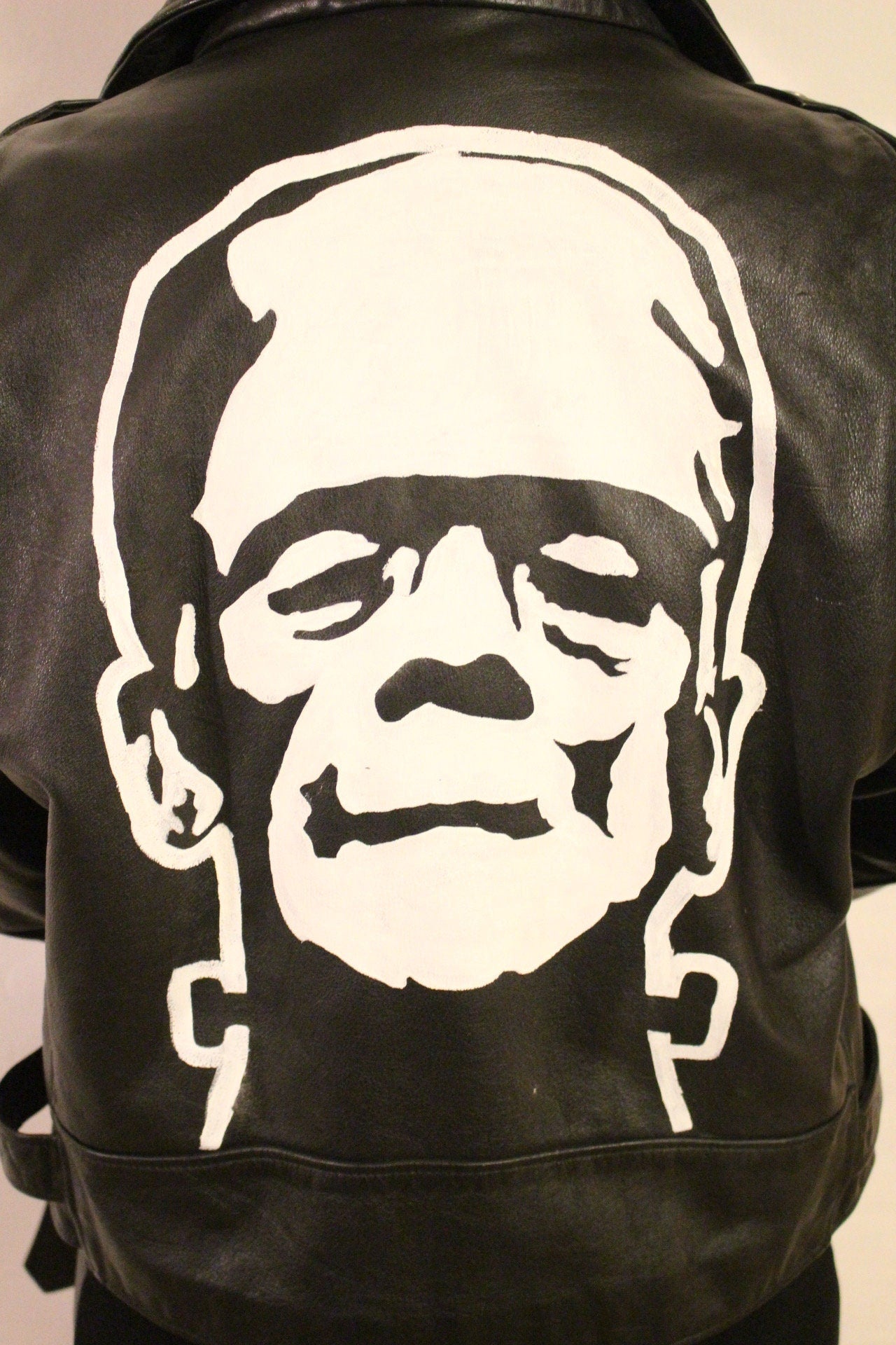 80s Vintage black motorcycle jacket with hand painted Frankenstein. Genuine leather biker with unique one off Boris Karloff design