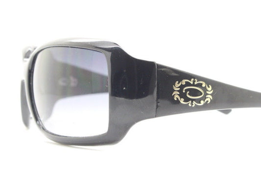 Oscar De La Renta Y2K vintage shield sunglasses. All black gloss wrap around visor with graduating lenses. 2000's bug eye mini mask