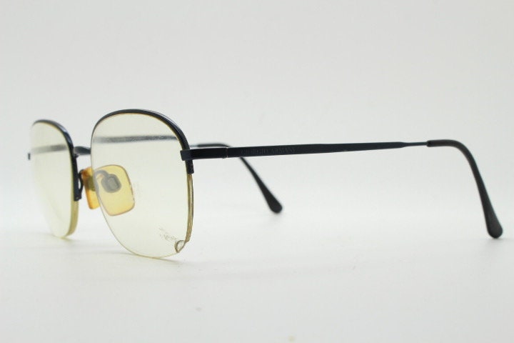 Giorgio Armani round eye glasses made in Italy. Minimal black satin finish half frame spectacles. Prescription optical eyeglasses. RX