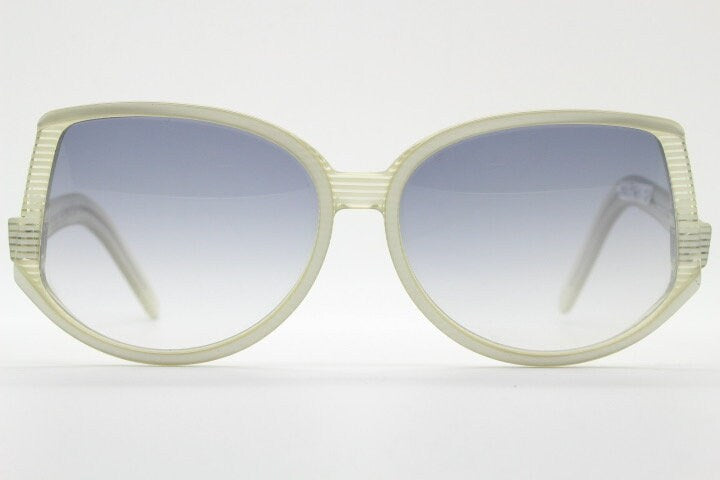 Silhouette 70s vintage abstract upside down sunglasses model 3018 made in Austria. Dynamic grey pearlised acetate frame with white stripes