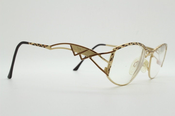Cazal 90s vintage eye glasses. Mesmerising metallic animal print optical frames with innovative arm design. Prescription eyeglasses. RX