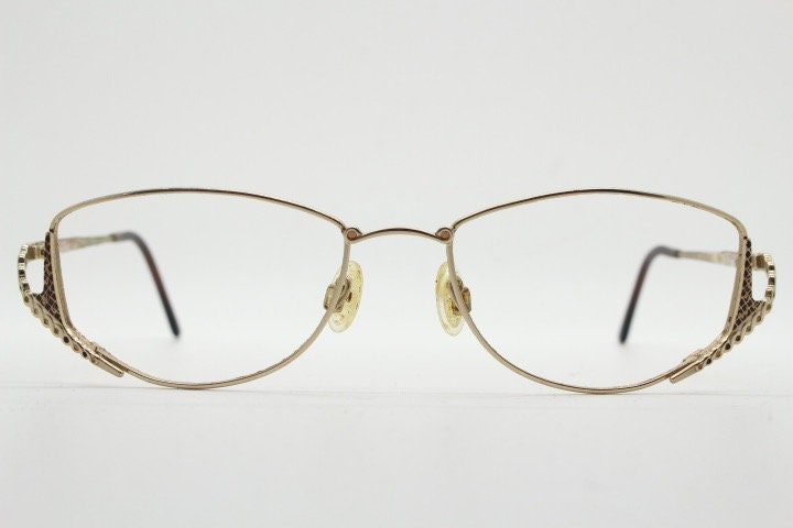 Cazal 90s vintage eye glasses. Innovative upside down design optical frames with arm holes and check pattern. Prescription eyeglasses. RX