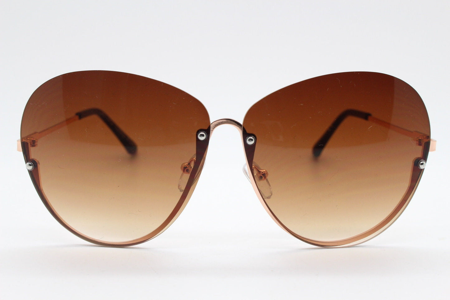 Y2K vintage large rimless sunglasses. Women's 70s style half frame design with graduating brown lenses and gold arms. 2000s BNWT