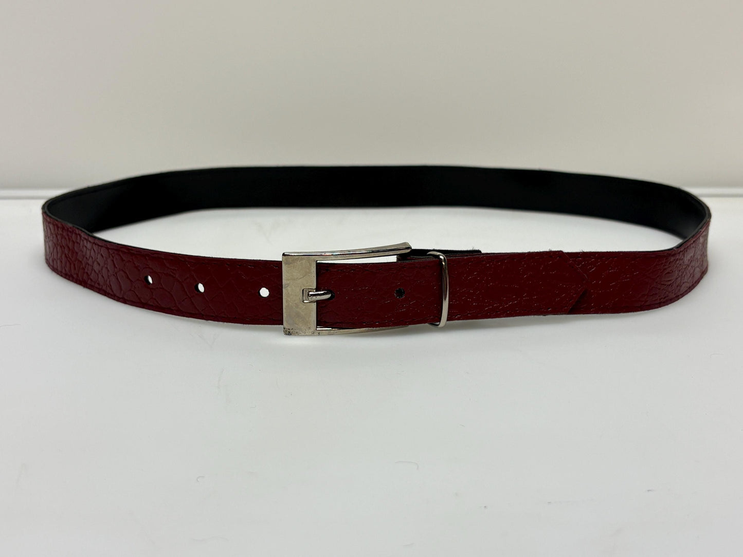 80s vintage womens embossed crocodile pattern 1" belt for jeans or trousers. Eco leather red vinyl with silver chrome buckle. Vegan