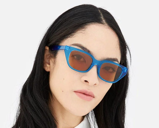 Retrosuperfuture thick cat eye sunglasses hand made in Italy. Intense blue acetate chunky frame with contrasting brown lenses. BNWOT