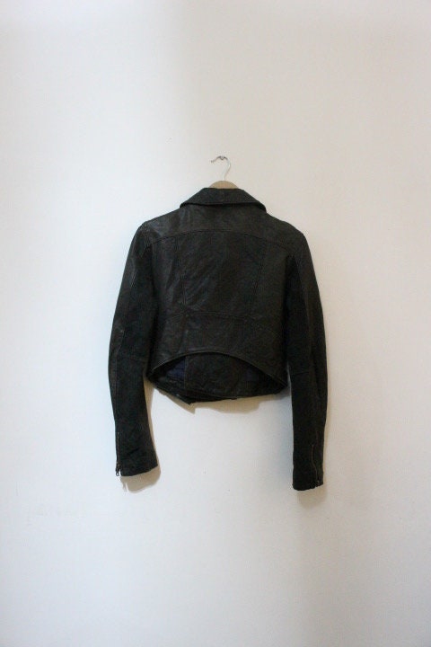Diesel black fitted womens motorcycle jacket. Genuine leather cropped biker design with fixed adjustable belt. Over 30% sale rrp 469 GBP