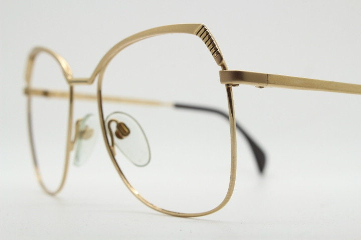 Silhouette 70s vintage eye glasses made in Austria. Womens sophisticated oversized angular gold optical frame. Prescription eyeglasses. Rx