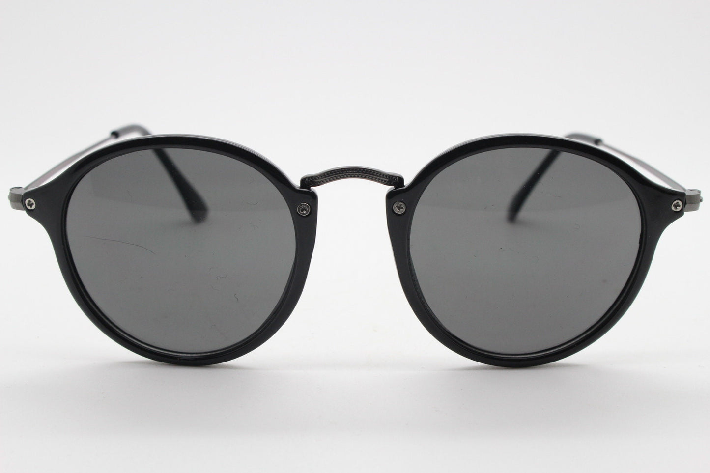 90s vintage round sunglasses. Black gloss slim 30s 40s design frame with metal bridge and dark lenses. Unused NOS