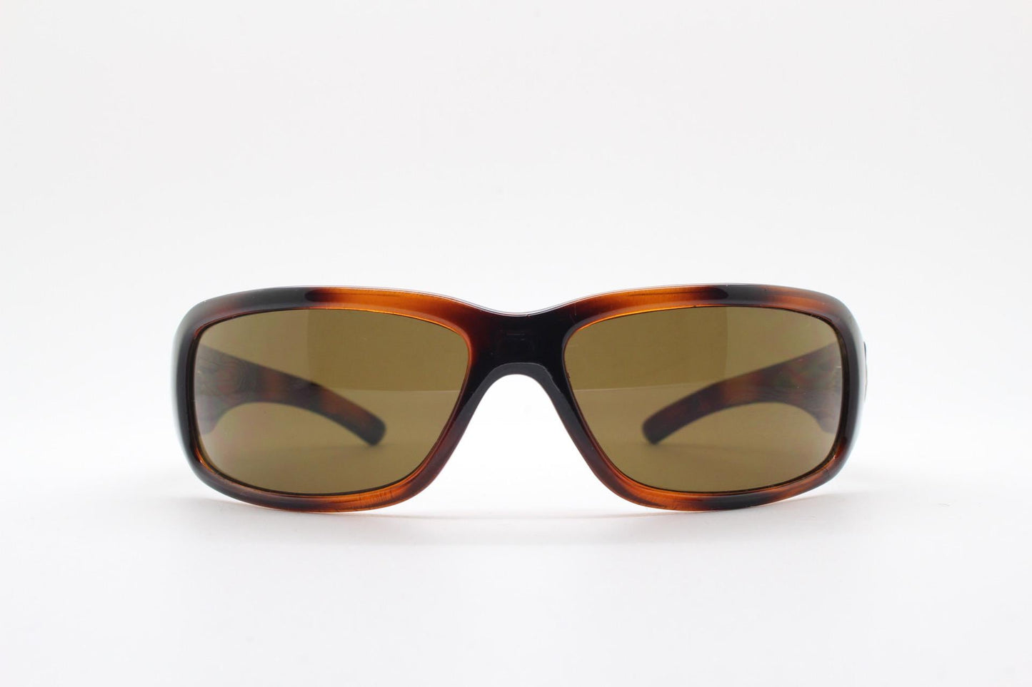 Y2K vintage curved wraparound sunglasses by Animal. Aerodynamic mottled brown gloss curved frame. Shield bug eye design. Biker shades. NOS