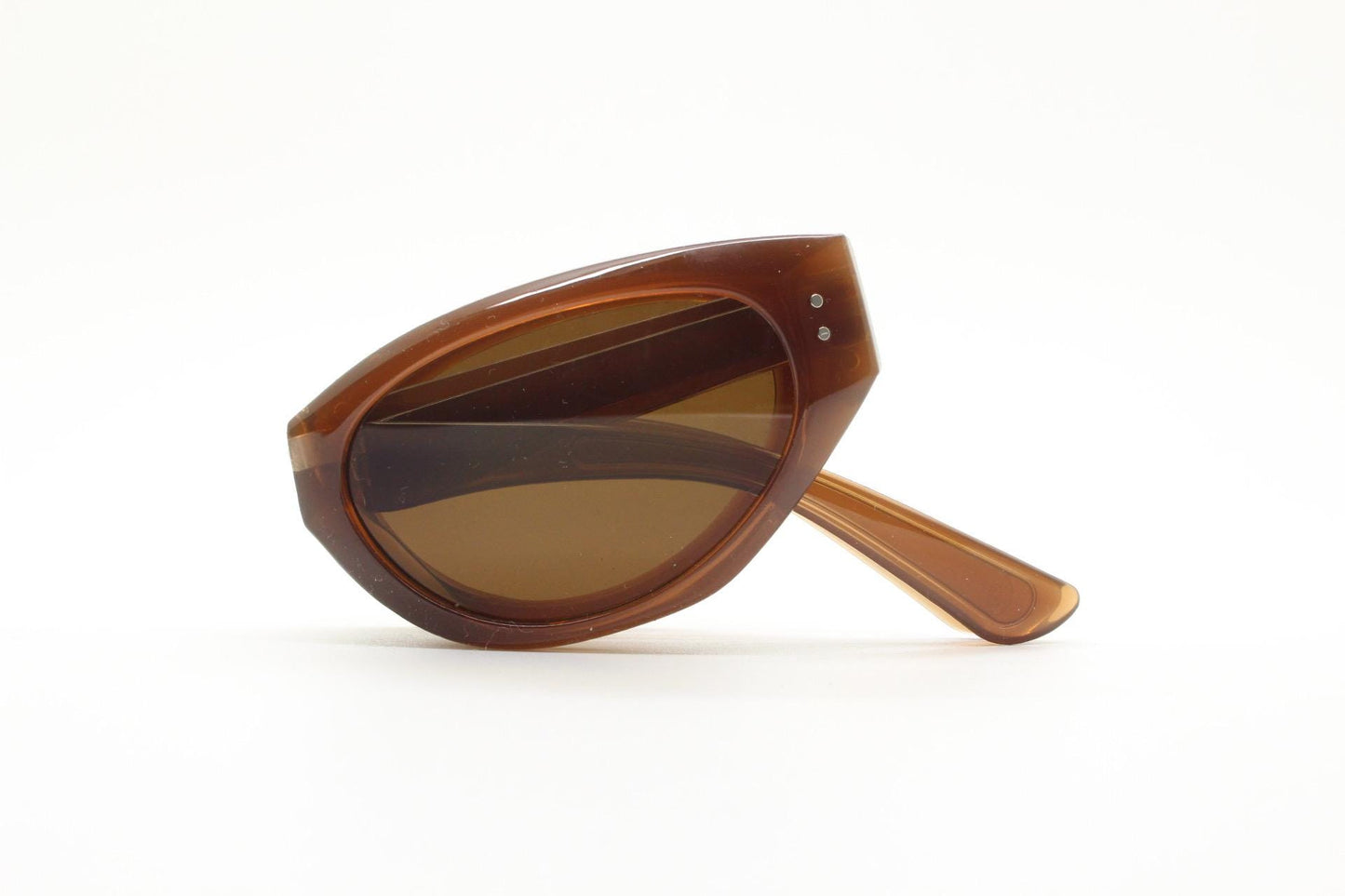 Vintage foldable cat eye sunglasses. Transparent brown folding compact cateye frame. Neat and clever folder design. Y2K NOS