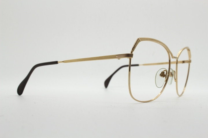 Silhouette 70s vintage eye glasses made in Austria. Womens sophisticated oversized angular gold optical frame. Prescription eyeglasses. Rx