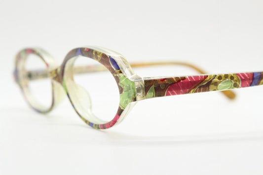 90s vintage small oval eye glasses. Low profile acetate optical frame with extraordinary abstract multi coloured pattern. Prescription RX