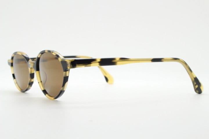 Robert La Roche 90s vintage oval sunglasses. Vibrant honey and mottled brown acetate undersized frame with plain brown lenses. NOS