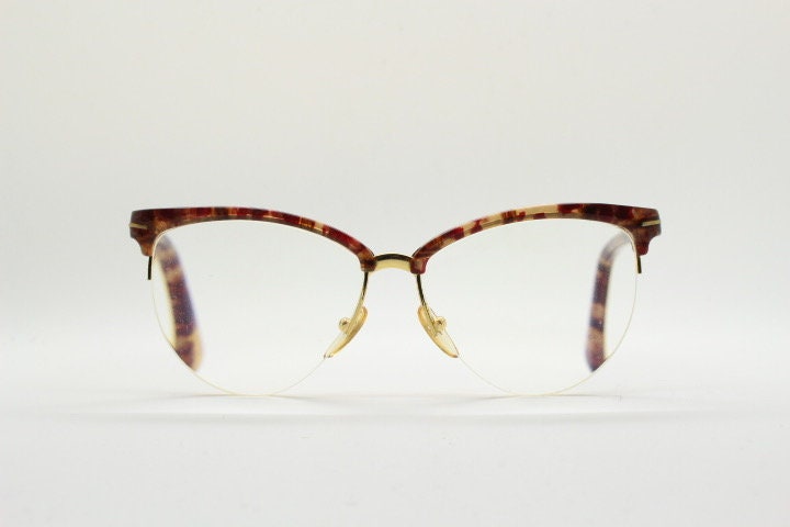Versace 90s vintage brow line cat eye glasses made in Italy. Elegant tortoise acetate cateye optical half frames. Prescription RX eyeglasses