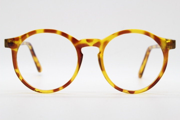 90s vintage round glasses. 30s, 40s design optical frames in a vibrant honey tortoise finish. Prescription eyeglasses. Spectacles.O Malley