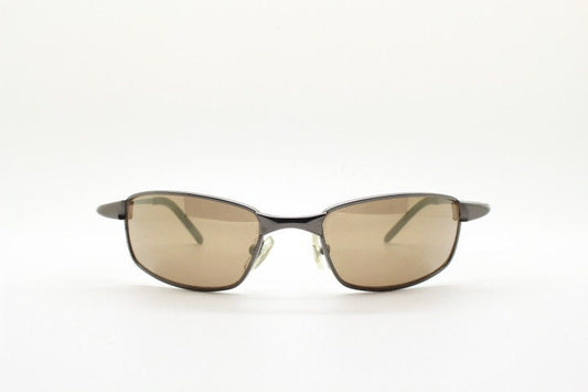 90s vintage curved rectangular sunglasses. Solid metal low profile frame in brown chrome with slightly mirrored lenses. 2000's. Y2K NOS