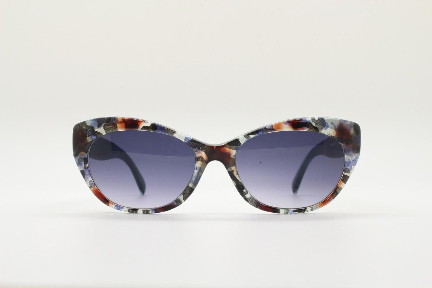 Piave 80s vintage colourful cat eye sunglasses made in Italy. Transparent cateye with abstract marbled patterns and gradient lenses. NOS