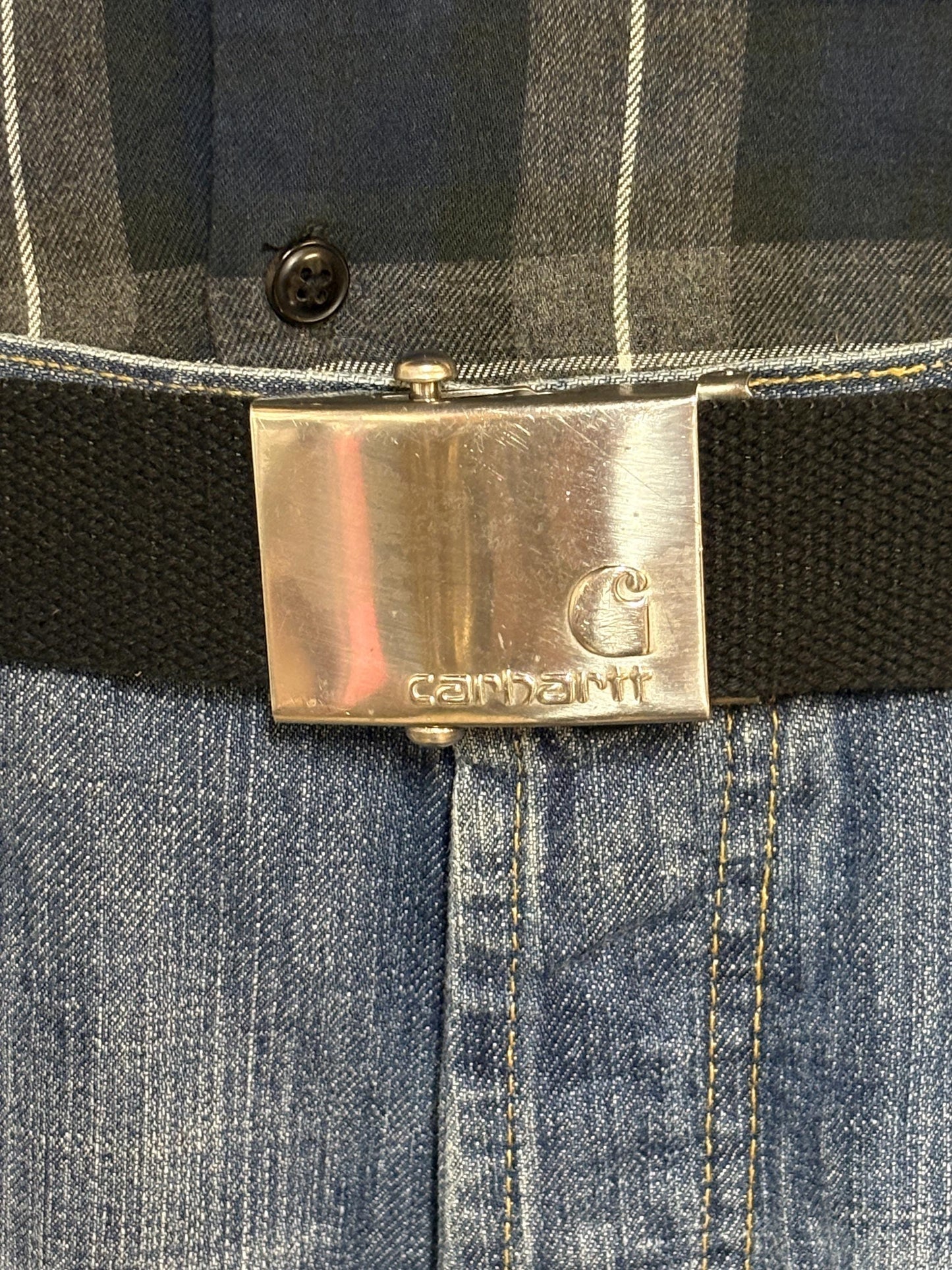 Carharrt vintage canvas army style belt buckle with 2 belts . One black plus one khaki green. no holes format. Slide lock . Fully adjustable