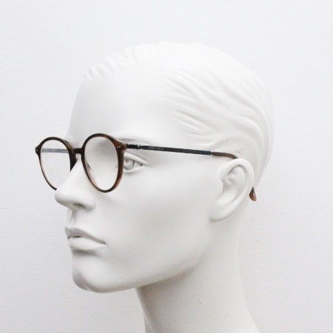 Giorgio Armani eye glasses model 7124 made in Italy. Mottled brown acetate optical frames with flat metal arms. Prescription eyeglasses. RX