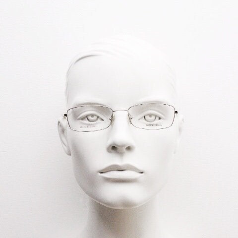 Giorgio Armani 90s vintage oval eye glasses made in Italy. Gold front with marbled white acetate arms. Optical frames. Prescription RX