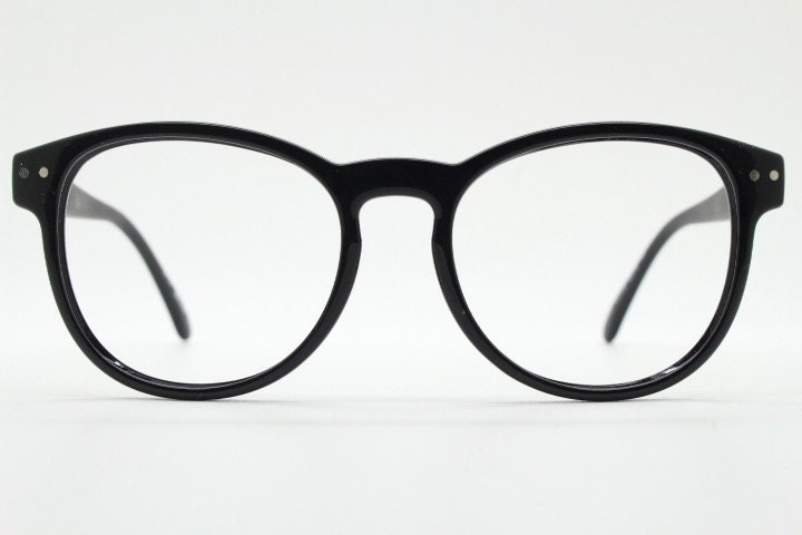 Just Cavalli vintage round eye glasses. Black gloss acetate optical frames with keyhole bridge. Prescription RX spectacles