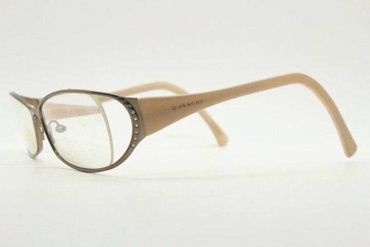 Givenchy eye glasses in brown chrome with beige acetate arms and gold diamante detail. Rhinestone optical frames. Prescription eyeglasses RX