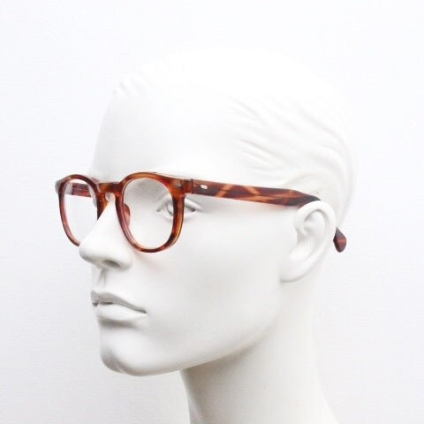80s vintage modified wayfarer style glasses. Tortoise optical frames with keyhole bridge and clear lenses. 40s, 50s style NOS eyeglasses