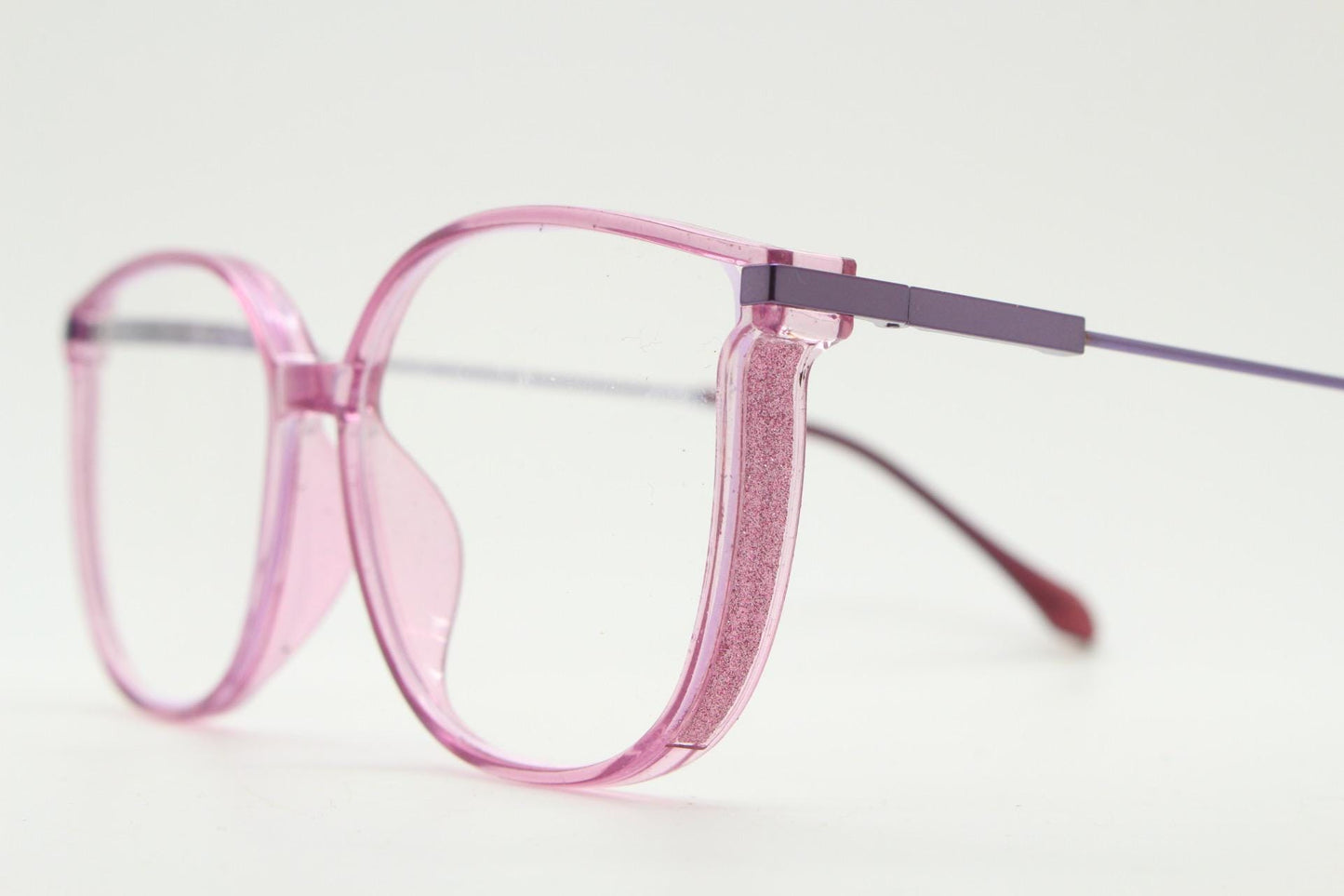 Round cat eye glasses. Transparent pink cateye optical frame with purple metal arms and eyecatching glitter sides. Vintage Prescription RX