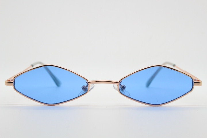 90s vintage small diamond sunglasses. Minimal gold psychedelic mod style frame with sky blue lenses. Unused New Old Stock