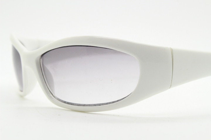Y2k vintage wrap around bug eye sunglasses. Curving ice white shield frame with light tone lenses. Rave. Super hero cosplay 2000s NOS