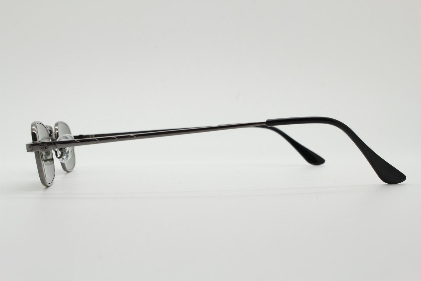 90s vintage small rectangular sunglasses. Imposing minimal gunmetal grey victorian style frame with green lenses. Steampunk. Unused NOS