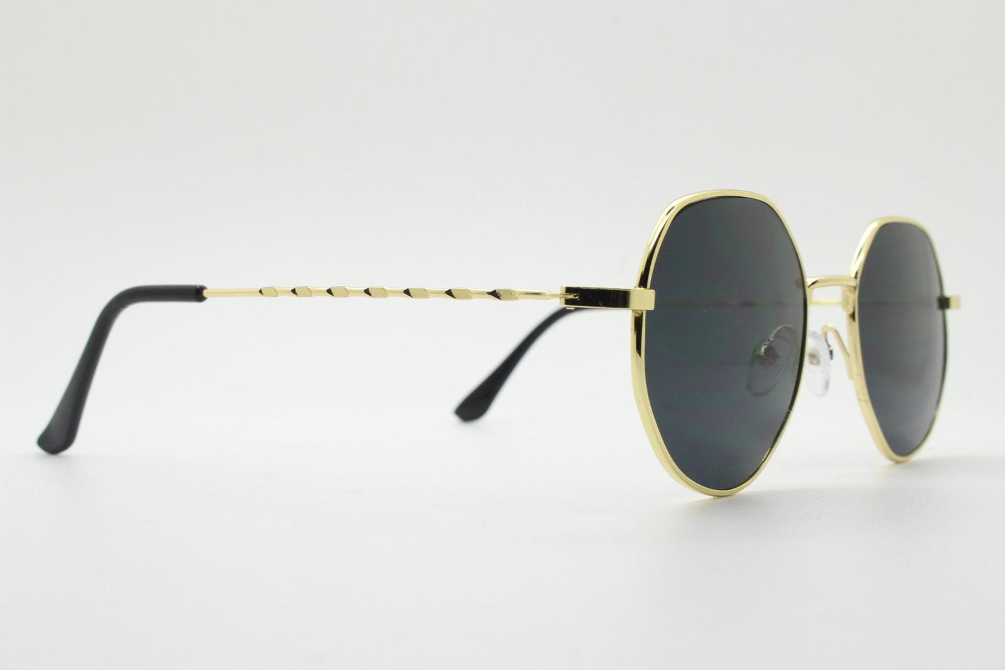 90s vintage modified aviator sunglasses, 6 sided soft angled metal frame in gold chrome with indented patterned arms. Unused NOS