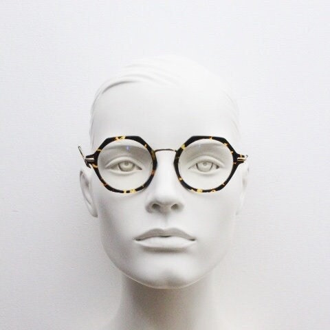 Kaleos hexagon eye glasses model Trevethyn made in Italy. Amber tortoise acetate optical frames with gold arms. Prescription eyeglasses. RX
