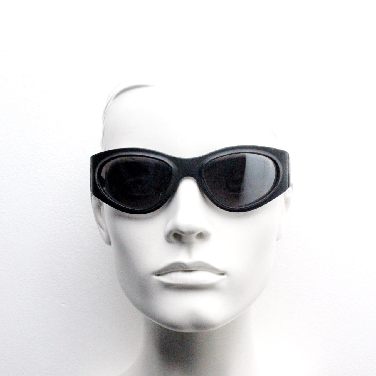 90s vintage futuristic super hero bug eye goggle sunglasses. Black rubber wrap around sporty shield frame with mirror lens. 2000s. Y2K. NOS
