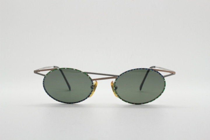 Taxi 90s vintage oval sunglasses. Unique innovative abstract design with extraordinary multi colour print. Casanova
