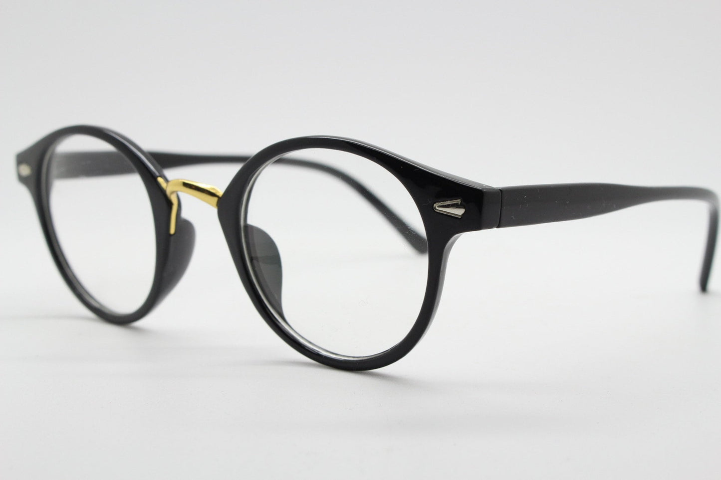 90s vintage slender frame glasses. Black with gold bridge optical frames. 40s, 50s style prescription eyeglasses. Clear lens eyeglasses. RX