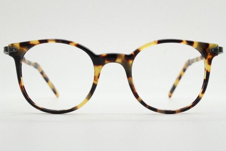 Sting 90s vintage round eye glasses made in Italy. Honey tortoise acetate optical frames. 40s retro design. Prescription eyeglasses. RX
