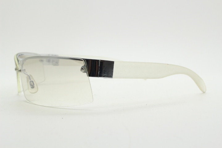 Y2K vintage wraparound sunglasses. Sick fashion grail half frame in silver chrome with extra light tone curving mirrored lenses. 2000's NOS