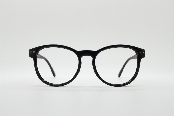 Just Cavalli vintage round eye glasses. Black gloss acetate optical frames with keyhole bridge. Prescription RX spectacles
