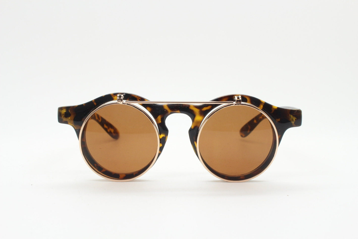 Vintage 90s round flipper sunglasses. 30s style tortoise frame with clear lenses and flip up sunglasses visor. BNWT unused