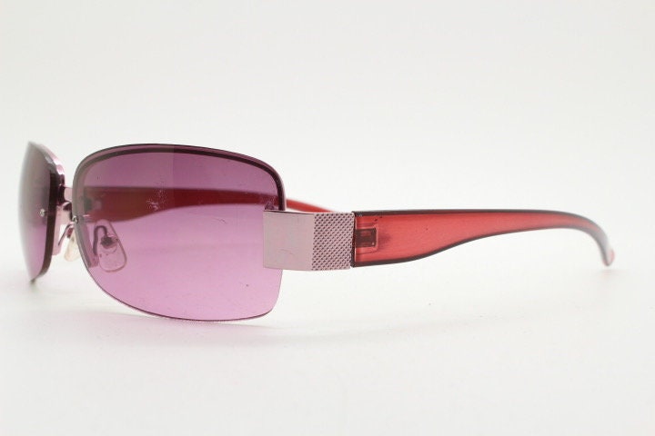 Y2K vintage big rectangular sunglasses. Half frame 2000's wrap around with purple curved lenses and matching purple chrome trim. 00's