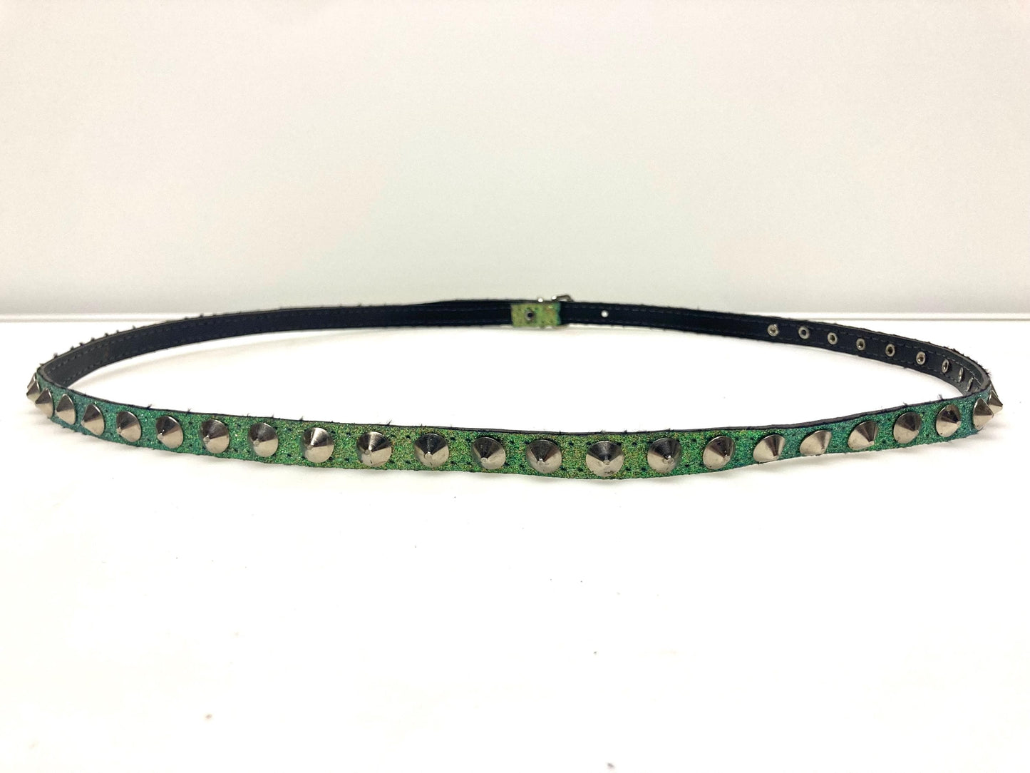 Y2k vintage womens slim green dust glitter belt with single row of silver metal cone studs. 2000s NOS. Size L. Goth. Cosplay