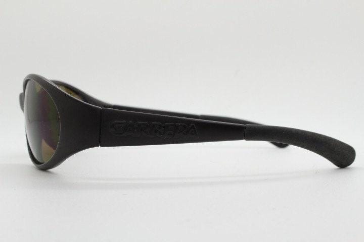 Carrera 90s vintage shield sunglasses made in Italy. Aerodynamic brown wrap around sport frame with big spell out logo. Bug eye. BNWT. NOS